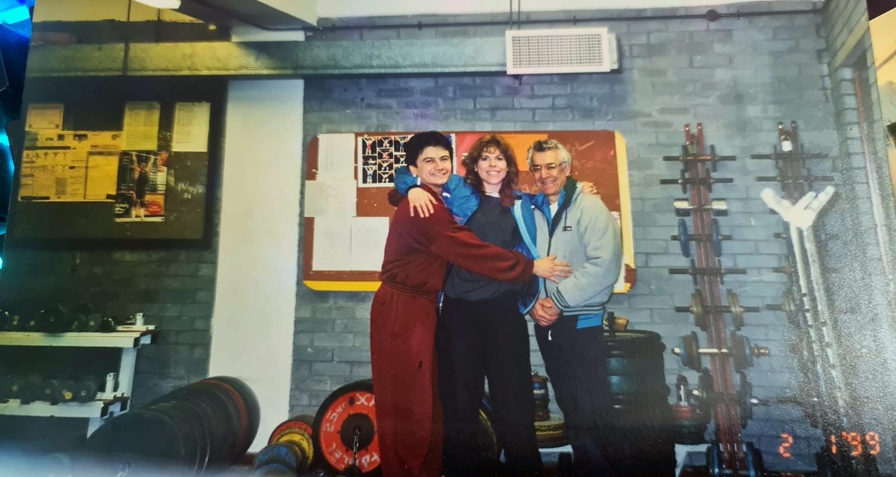 Brian with club members in the Woking gym, 1999